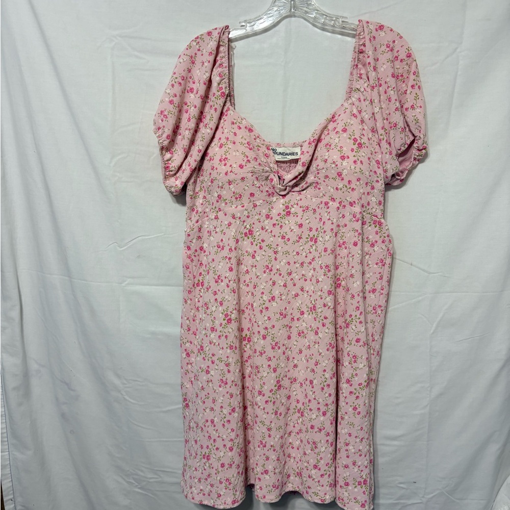women's mini dress with puff sleeves and a pink floral print.